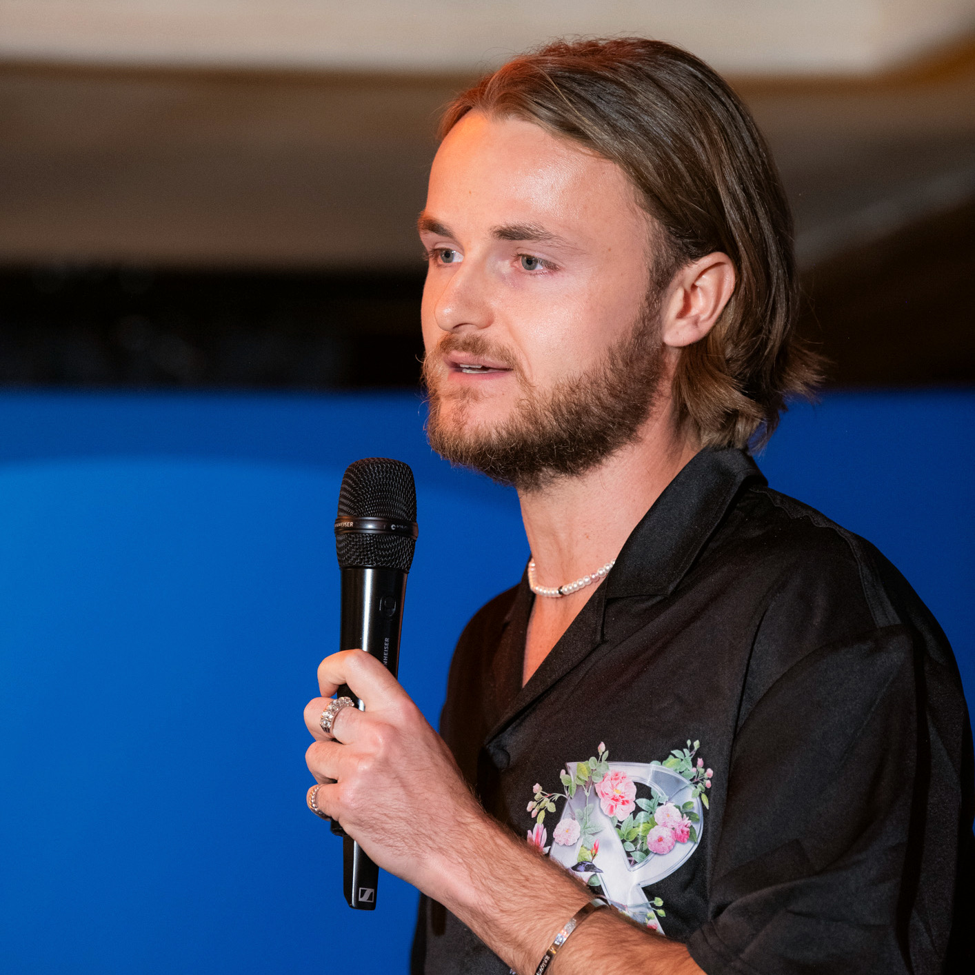 Jake speaking at an event